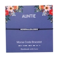 Detail of handmade Morse code auntie bracelet with silver beads on a floral card - Auntie