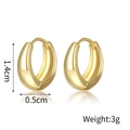 Detailed view of gold plated teardrop earrings with dimensions 1.4cm by 0.5cm and 3g weight - Medium