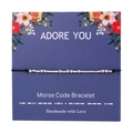 Morse Code Bracelet with silver beads on adjustable black cord on a floral display card - ADORE YOU