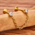 Detail of 316L gold stainless steel chain labret with clear round zircon gemstones - 6mm / Gold
