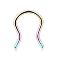 Macro detail of U-shaped stainless steel nose ring with a colorful rainbow gradient finish - Colorful