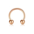 Detail of rose gold circular barbell nose ring with reflective surface on white background - Type A Rose Gold