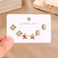 Detailed macro of 16K gold plated stud earring set with zircon floral designs - Cross Star Colorful Flower And Oval Style (0026-3)