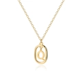 Detailed view of golden oval pendant necklace featuring a polished letter Q charm - Letter Q