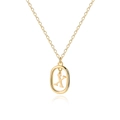 Detail of minimalist gold chain with oval pendant featuring the metal letter X engraving - Letter X