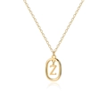 Detailed macro view of minimalist gold letter Z pendant on a fine link chain with reflection - Letter Z