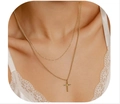 Close-up of elegant double-layered gold cross necklace worn by model with lace clothing - Lace Background 2-Layer Layered Cross (Style 27)