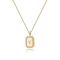 Detail of gold shell pendant necklace with zircon border and white enamel letter Y - Letter Y