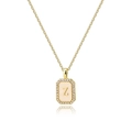 Macro view of gold octagonal pendant with shell inlay, zircon border and Z letter detail - Letter Z