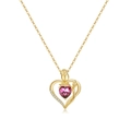 Macro detail of 18K gold heart pendant with pink gemstone and small rose accent - July