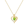 Detail of 18K gold heart pendant with green peridot gemstone and rose leaf motif - August
