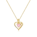 Detail of 18K gold necklace featuring a pink heart gem and intricate rose floral design - October