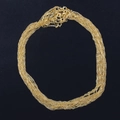 Close-up of gold plated 18KGP water wave chains with lobster clasps on black background - 2mm / Gold Water Wave Style (53237-BM0603)