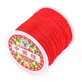 Detail von roter Nylonschnurspule für chinesische Knoten und DIY-Schmuckhandwerk - Rot