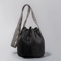 Black woven bucket bag with tassels and geometric pattern strap for vacation style - 22cmx22cmx17cm / Black