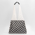 Handwoven white mesh bag with a black inner pouch for a modern bohemian beach style - White/Black