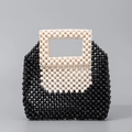 Bolso de mano artesanal de cuentas tejidas en contraste negro y blanco crema - Negro + Blanco Leche
