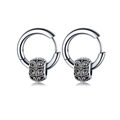Silver hoop earrings featuring a vintage hollow leaf pattern bead on a white background - Silver Retro Etched Bead (Style 32)