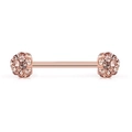 Detailed macro view of 14G rose gold barbell piercing with sparkling crystal disco balls - US 12 / Rose Gold Bar + Pink Stones