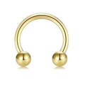 Detailaufnahme des goldenen Hufeisen-Piercings mit polierten Verschlusskugeln - Hufeisen Ball Stil / Gold