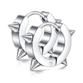 Macro detail of silver stainless steel hoop earrings with gothic rivet spike accents - Rivet Spike Style (HUN168805133) / Silver