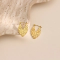Macro detail of V-shaped gold earrings showing textured hammered finish and secure clasp - Hammered V-Shape Style (EH237)