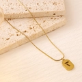 Close-up of 18K gold plated snake chain featuring a hollow T-letter rectangular pendant - Rectangular Hollow T Letter Tag Snake Chain (XL113)