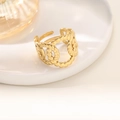 Close-up of gold 18K plated irregular hollow ring with interlaced link chain detail - Interlocked Double C Chain Style (JZ019) / Gold