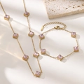 Detailed view of 18K gold plated stainless steel jewelry set with emerald-cut pink zircon stones - Bracelet / Pink Bracelet