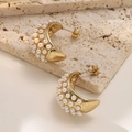 Elegant C-shaped 18K gold plated earrings with white pearls on a travertine stone - C-Shaped Multiple Pearl Inlay Style (EH559)