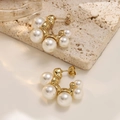 Close-up of vintage gold C-shaped earrings with pearls and hammered texture - Hammered C-Shape Multiple Pearl Style (EH564)