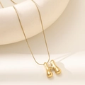 Polished 18K gold letter H bubble pendant on a sleek snake chain necklace - Letter H Bubble Style (XL152-H)