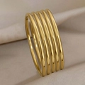 Close-up of minimalist 3mm stackable 18k gold-plated stainless steel bangles set - Set And 5 / Gold (SZ051)