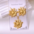 Macro detail of sunflower jewelry set including earrings and necklace in 18k gold steel - Layered Sunflower (TZ186)