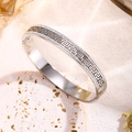 Silver stainless steel greek key bangle with pavé zircons on white stone stand - Meander Rhinestone Bangle (2340) / Silver