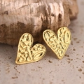 Detailed macro view of 304 stainless steel gold heart earrings with hammered vintage texture - Vintage Lava Texture (EH083)