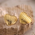 Golden heart-shaped ribbed earrings in 304 stainless steel displayed on stone - Ribbed Texture (EH068)