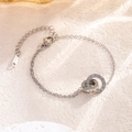 Collar de doble anillo plateado con números romanos en acero inoxidable pulido - Pulsera Plateada