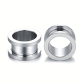 Polished silver stainless steel flesh tunnels showing side profile and hollow core structure - US 3