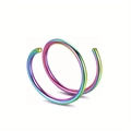 Macro detail of rainbow iridescent stainless steel double spiral piercing ring - Colorful