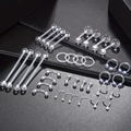 Set completo da 36 pezzi di piercing in acrilico con anelli e borchie su sfondo nero lucido - Assorted Piercing Mix C / 36 Pezzi / Trasparente/Palline Assortite