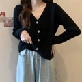 Gilet noir classique à col en V avec boutons brillants et tissu en maille douce - Taille unique / Noir