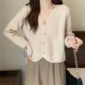 Gilet en maille beige à col en V, coupe décontractée et texture côtelée très douce - Taille unique / Abricot