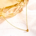 Golden heart pendant necklace with champagne birthstone on stainless steel chain - December Brown