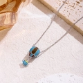 Collier doré avec pendentif montgolfière, breloque théière et détails en émail coloré - Pendentif Théière Fantaisie (81432) / Montgolfière Bleue Brune (Argent)