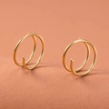 Detailed close-up of golden double hoop earrings with minimalist parallel circle design - 8mm / Gold