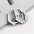 Macro shot of silver hexagonal stainless steel earrings with brushed and polished texture - Hexagon Steel Color