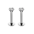 Macro-detail van platte labret piercings van staal met ronde zirkonia-steentjes - Stijl D