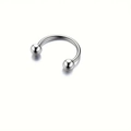 Vue macro d'un piercing fer à cheval en acier inoxydable avec billes lisses - 1.2x8x3mm / Acier