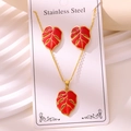 Golden stainless steel jewelry set featuring tropical monstera leaves with red enamel - Monstera Leaf Style (TZ261-Red)